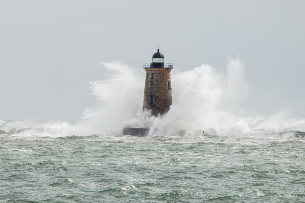 Waves crashing against Whaleback Lighthouse on Saturday afternoon.