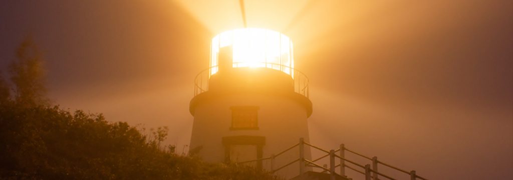 Owls Head Lighthouse shining through the fog