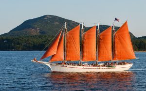 Schooner Margaret Todd passing in front of Champlain Mountain in Acadia