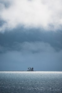 Storm clouds over the Rockland Breakwater Lighthouse