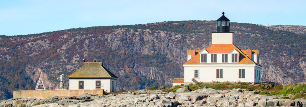 Egg Rock Lighthouse with Champlain Mountain in the background