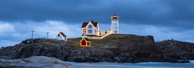 Nubble Lighthouse adorned with Christmas Lights.