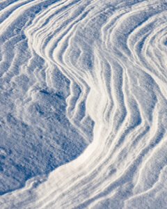 Patterns in the wind blown snow.