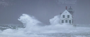 Storm waves crash against the Rockland Breakwater.