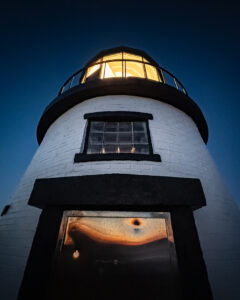 Looking upward at the Owls Head Lighthouse.